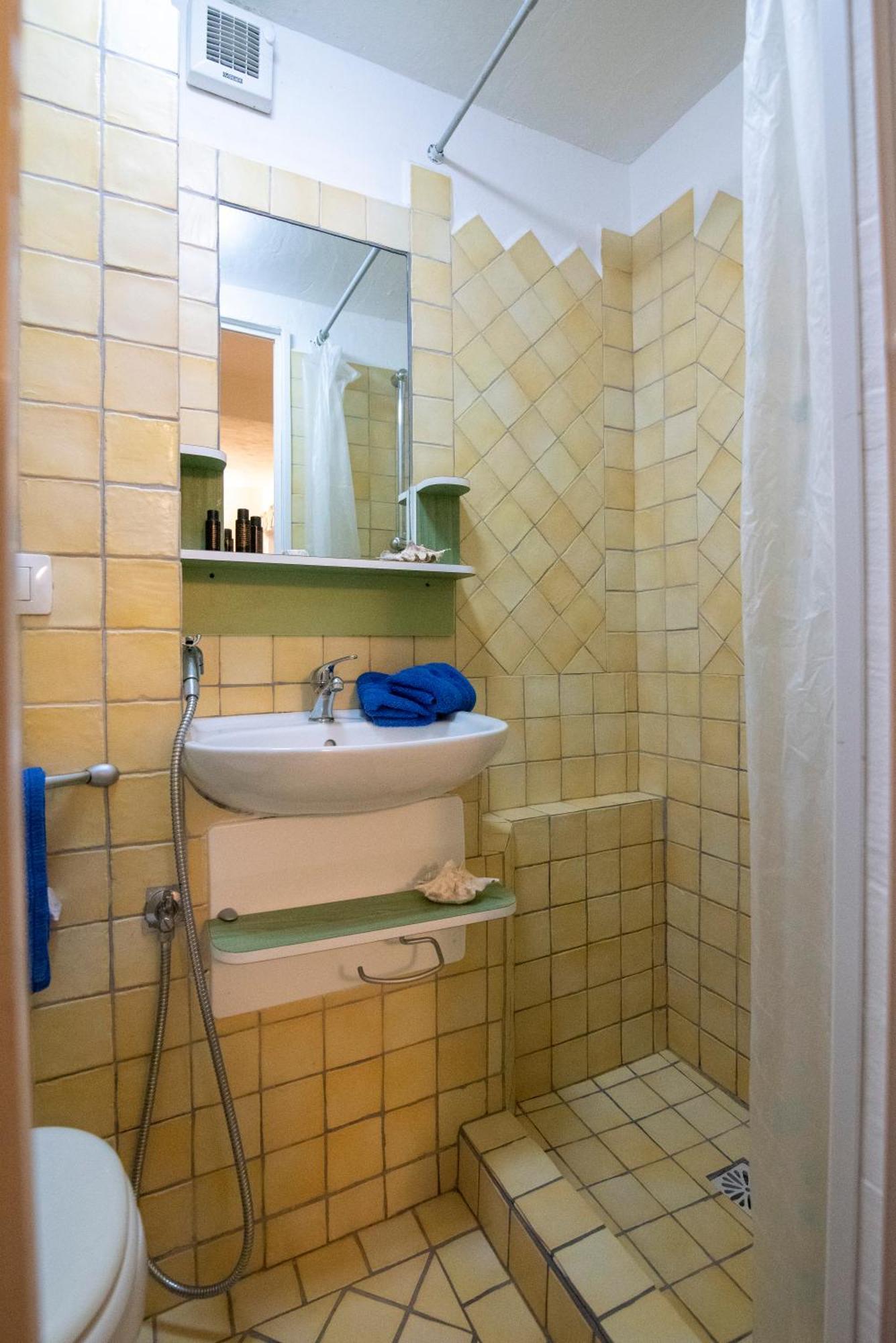 サンタ・テレーザ・ガッルーラLe Residenze La Marmorataアパートメント 部屋 写真